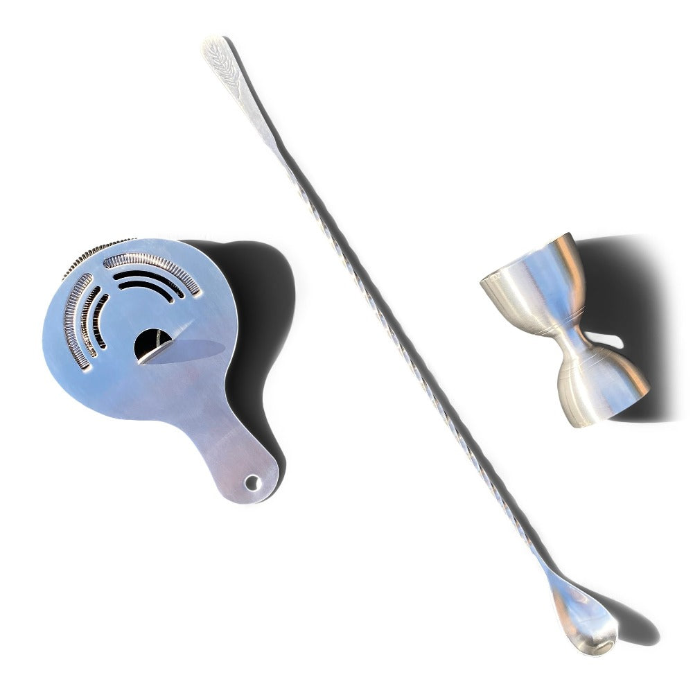 Amehla Co. Three piece stainless steel bartender kit. Includes bar spoon, jigger, and hawthorne strainer.