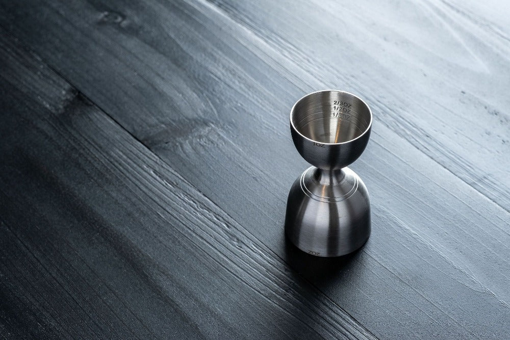 Stainless steel rounded double jigger from Amehla's three piece cocktail essentials for bartenders and mixologists