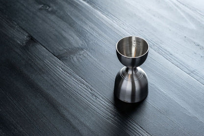 Stainless steel rounded double jigger from Amehla's three piece cocktail essentials for bartenders and mixologists