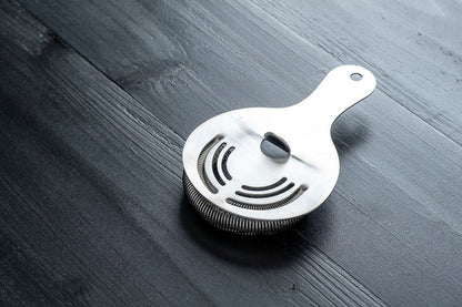 Stainless Steel Hawthorne Strainer from Amehla's three piece cocktail essentials for bartenders and mixologists
