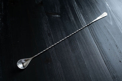 Stainless steel rounded double jigger from Amehla's three piece cocktails essentials kit for bartenders and mixologists.