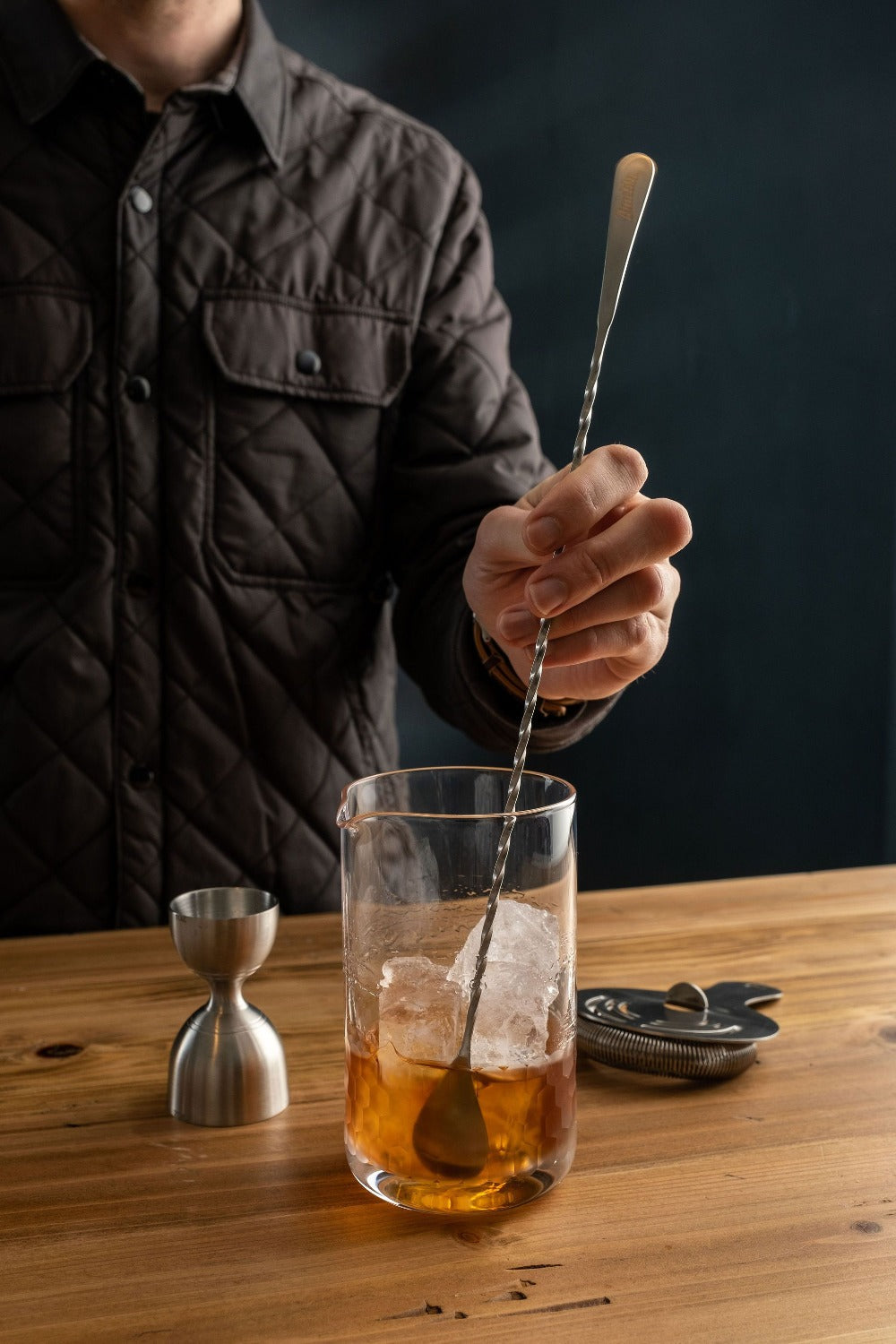 Amehla's Honeycomb Mixing glass, barspoon, jigger, and strainer being used by Jordan Hughes of High Proof Preacher